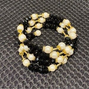 Elegant Black & White Beaded Coil Bracelet with Gold Accents